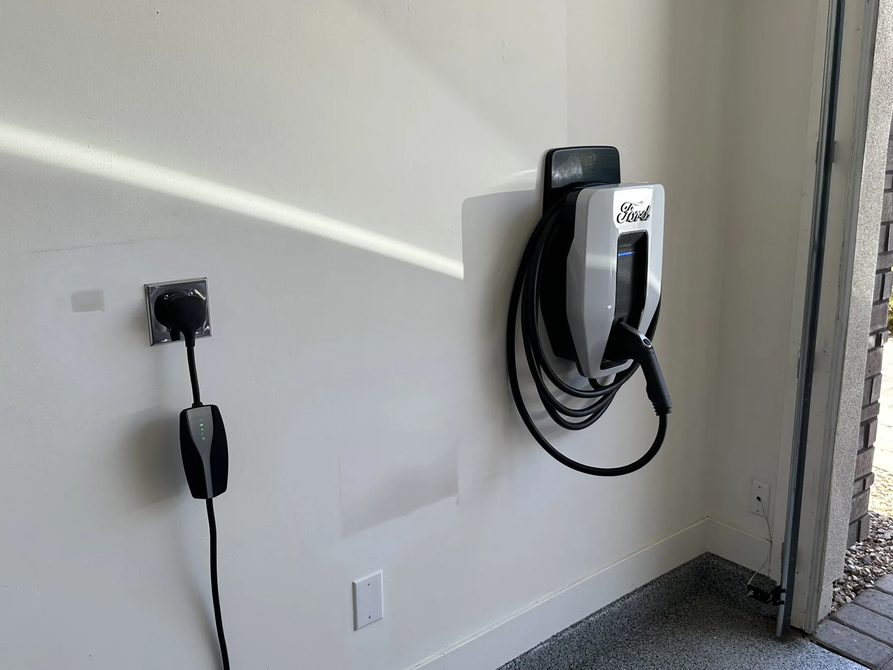 Clean wall-mounted EV charger installation by DeVita Electric